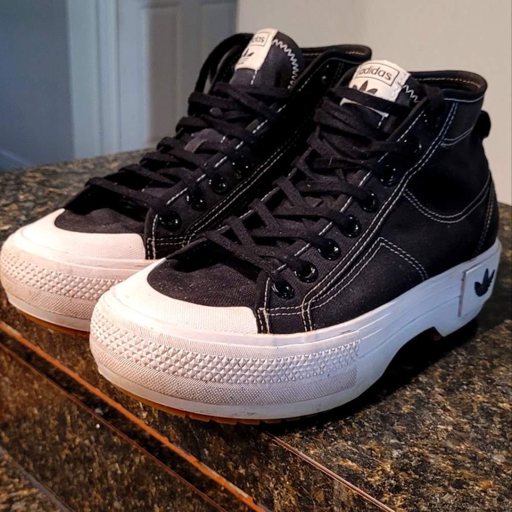 Adidas Nizza Trek platform sneaker.  Black with white stitching. 8M
